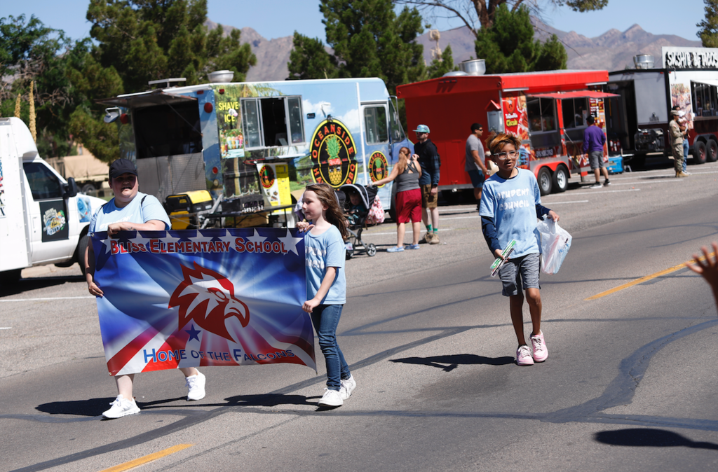 Bliss Elementary School students and staff participating in Armed Forces Parade