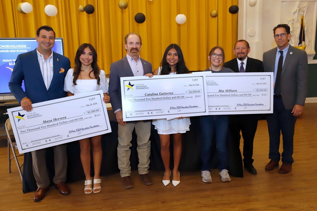 El Paso ISD Education Foundation, El Paso ISD Superintendent Dr. Brian Lusk, and Burges High School students take group photo after receivingscholarship funds with giant checks