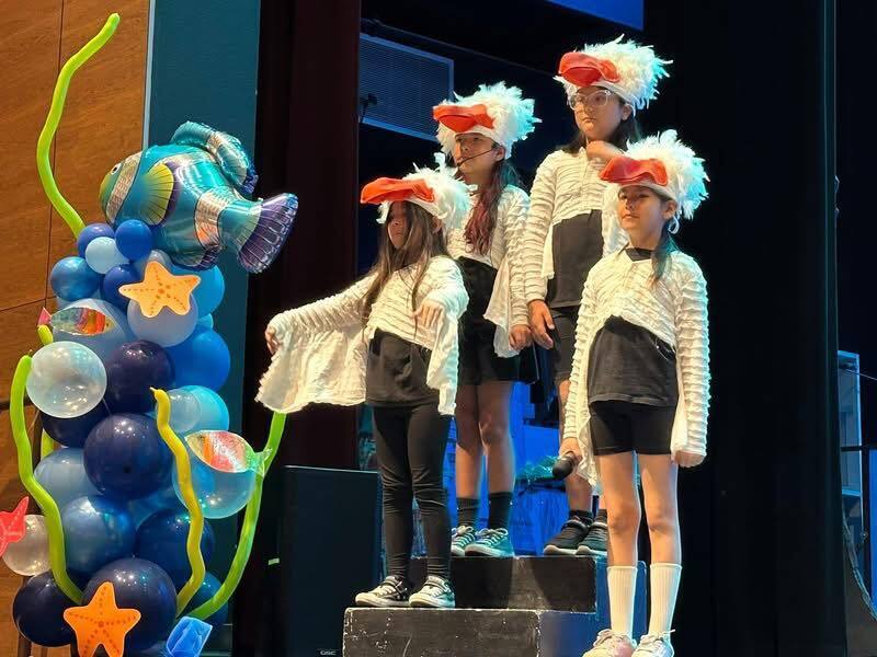Crockett Elementary Fine Arts Academy students dressed as seagulls performing during Finding Nemo KIDS