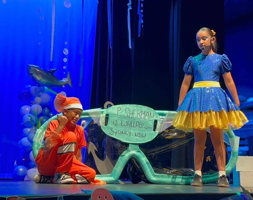 Crockett Elementary Fine Arts Academy students dressed as Marlin and Dory performing during Finding Nemo KIDS