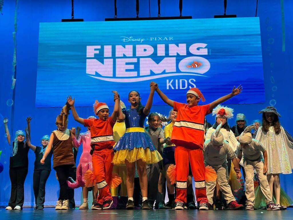 Crockett Elementary Fine Arts Academy students take a bow after performing in Finding Nemo KIDS