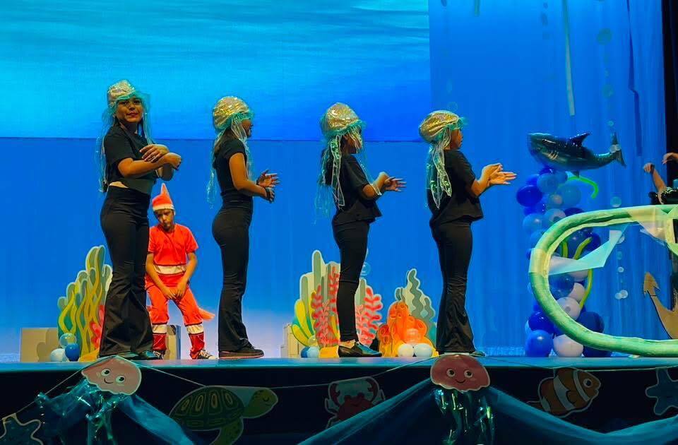 Crockett Elementary Fine Arts Academy students dressed as squids performing during Finding Nemo KIDS