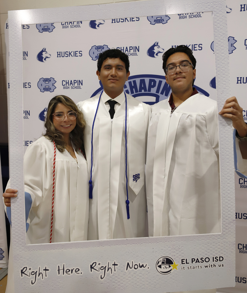 Chapin High School graduates smile in Right Here Right Now Giant Polaroid frame
