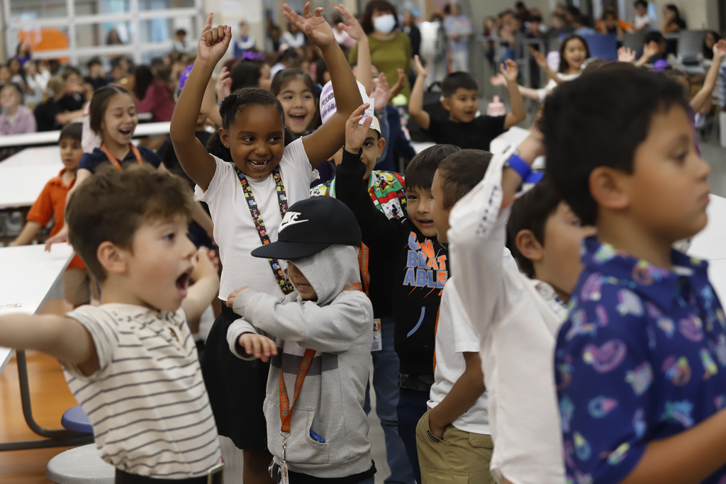 students cheer excitedly
