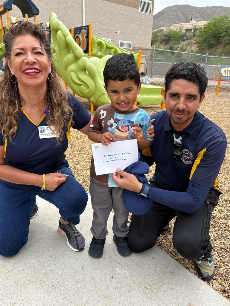 Attendance Challenge Student winner takes photo with prize 