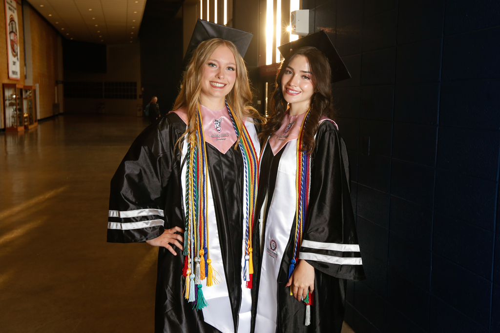 Two YWA students smile for a photo