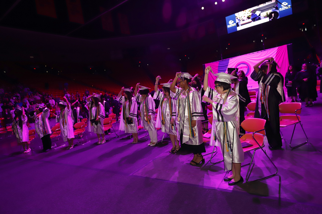 YWA graduates turning their tassels