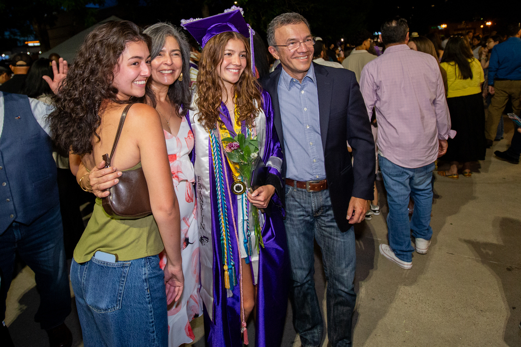 Franklin graduate taking photo with family