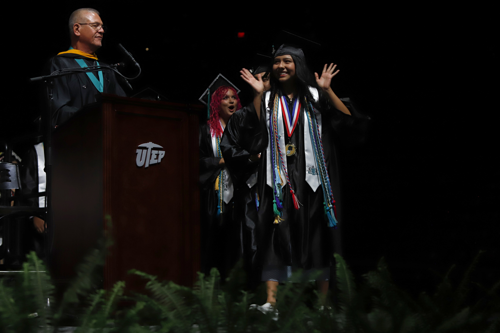 TMECHS grad cheers right before receiving diploma