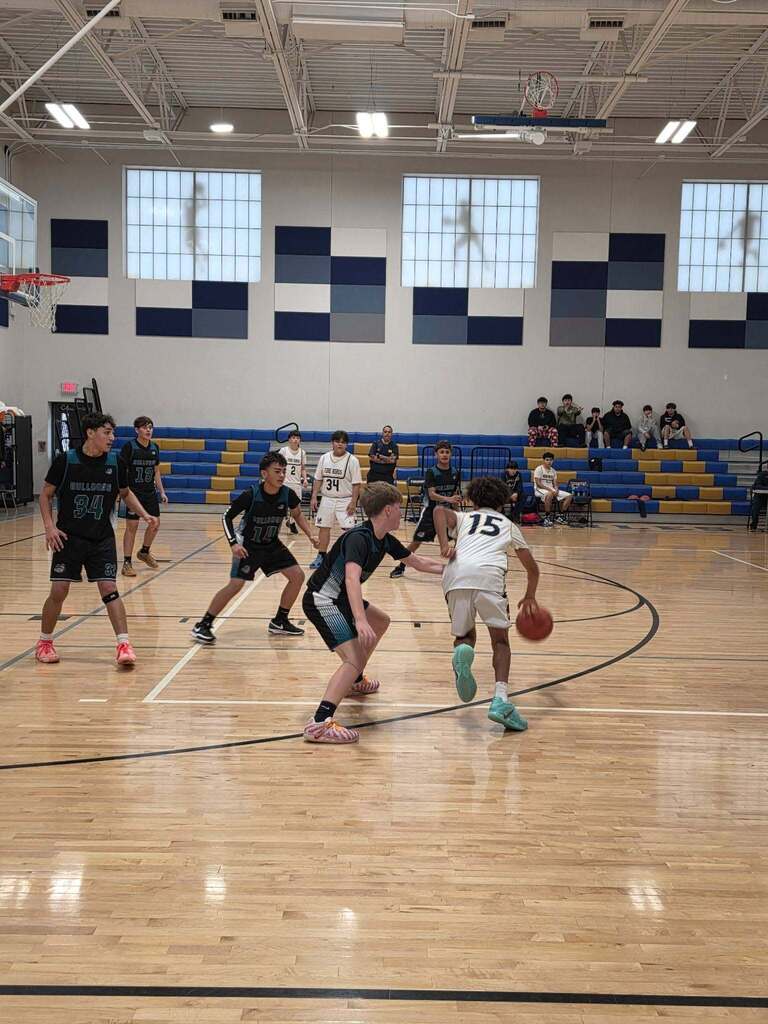 Murphree boys basketball team playing during match