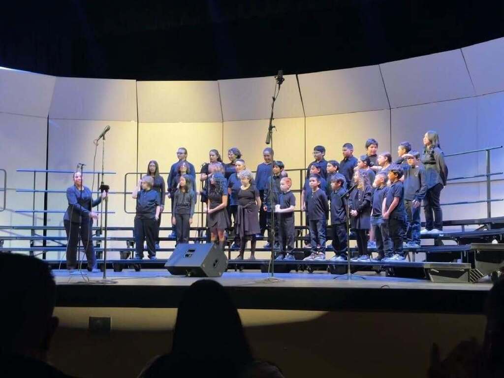Murphree choir students on stage