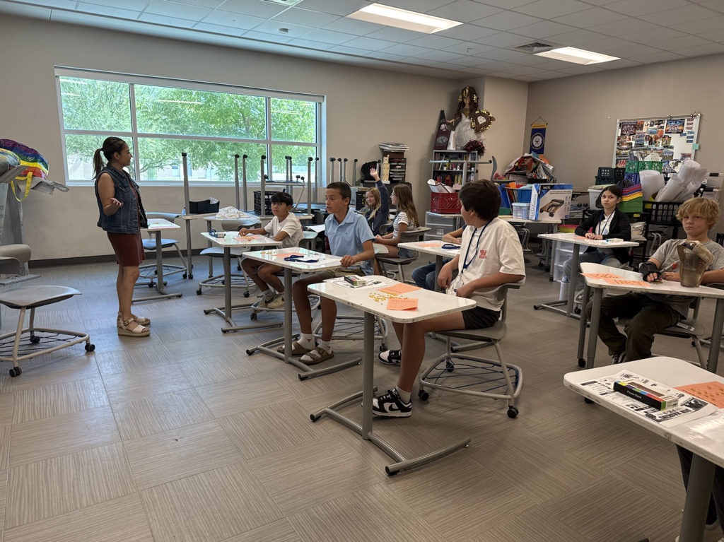 Haskins PK-8 students ask teacher questions in classroom