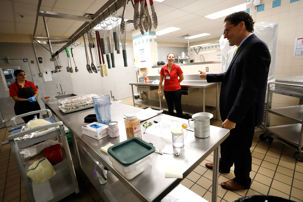 Superintendent Dr. Lusk talks to Brown Middle School cafeteria staff