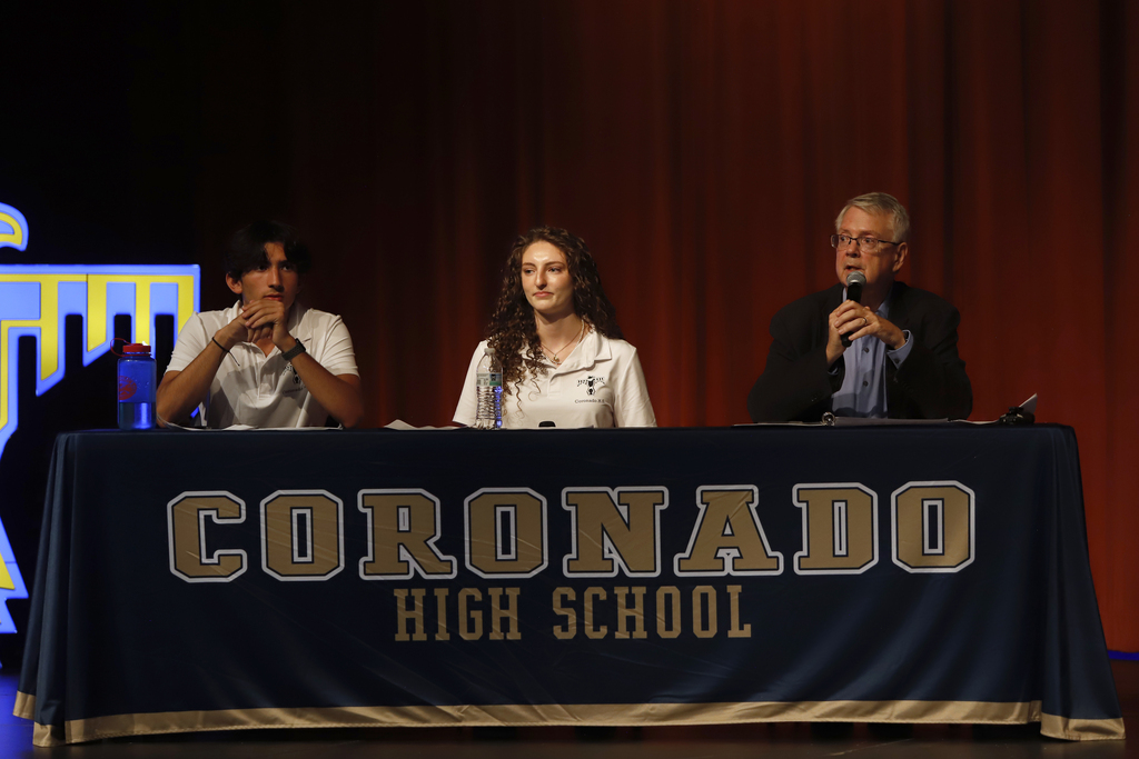 Student and guest moderators talking