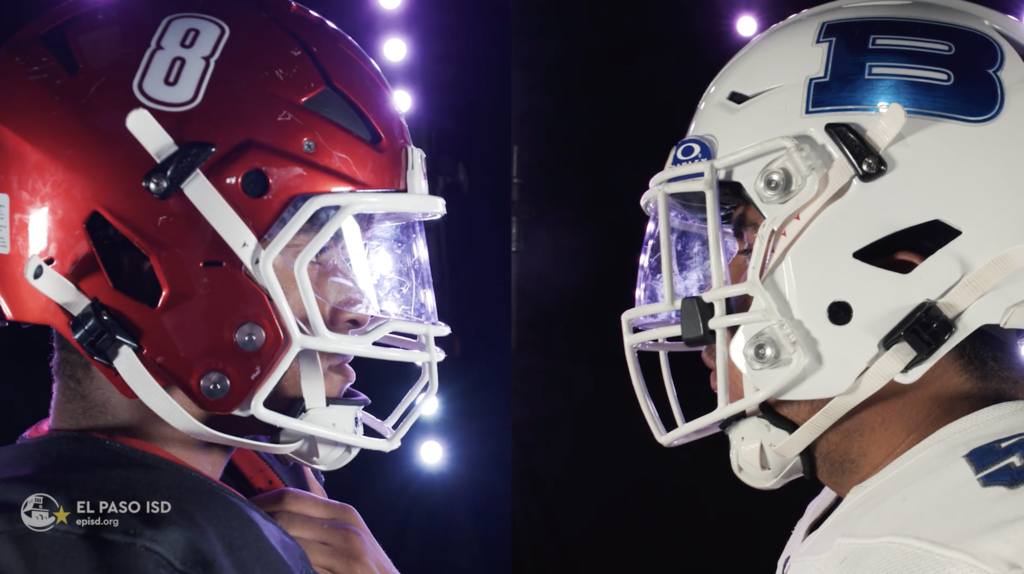 Jefferson Silva and Bowie football players looking at each other in a close up
