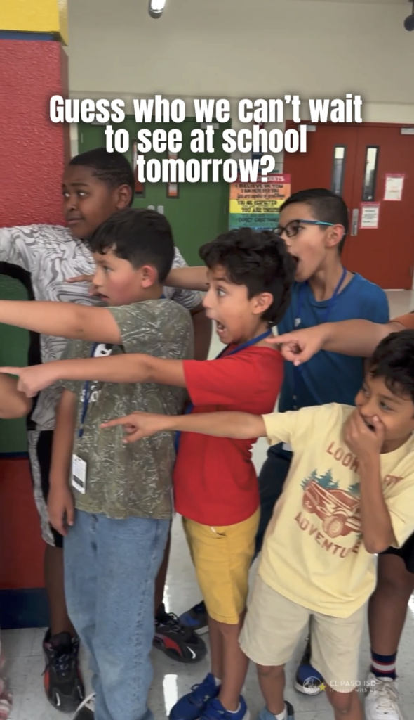 Photo of Whitaker Elementary students pointing while looking shocked with text that says Guess who we can't wait to see at school tomorrow?