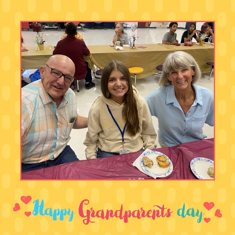 El Paso ISD student takes photo with grandparents during grandparents day breakfast