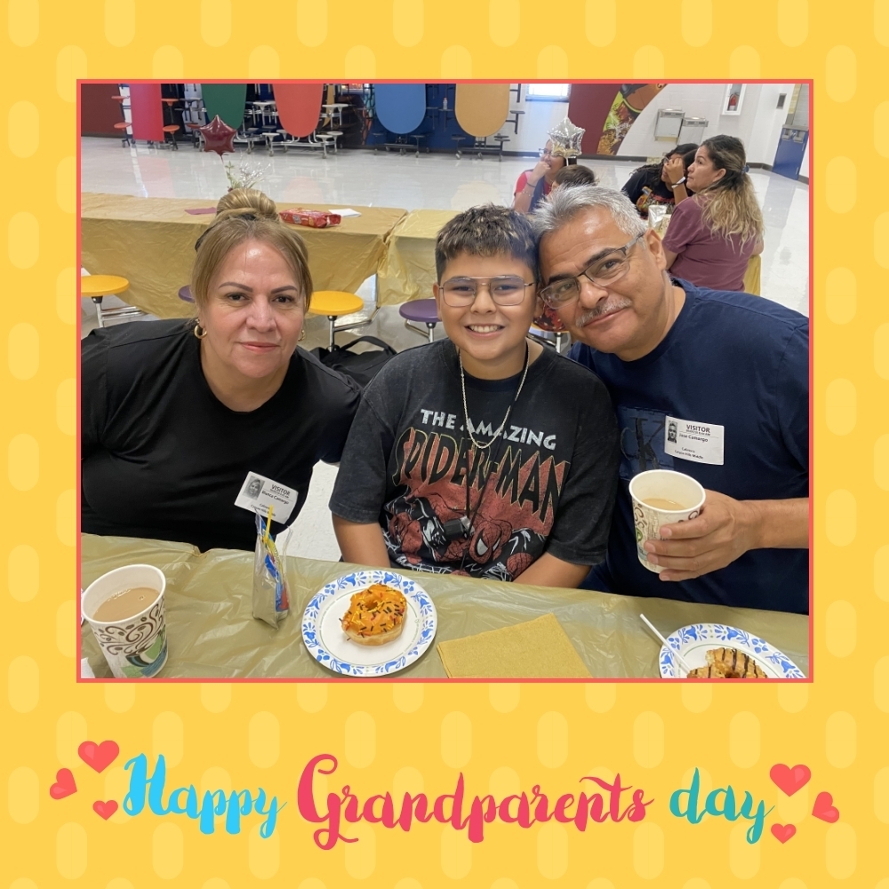 El Paso ISD student takes photo with grandparents during grandparents day breakfast