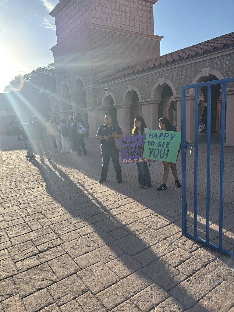 Guillen Middle School students welcoming students into school