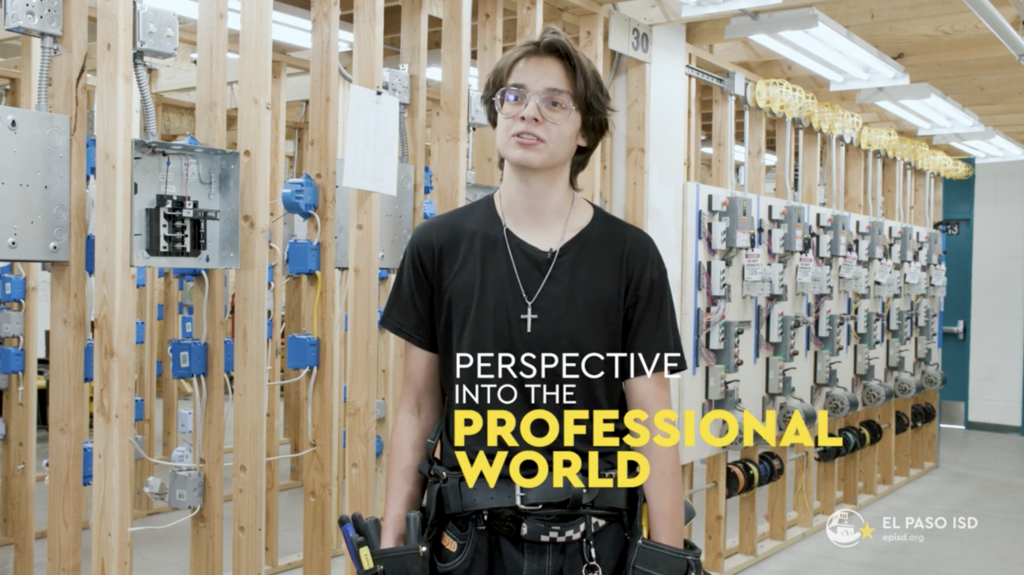 Photo of CCTE student in hands on electric panels classroom talking with text that says Perspective into the professional world