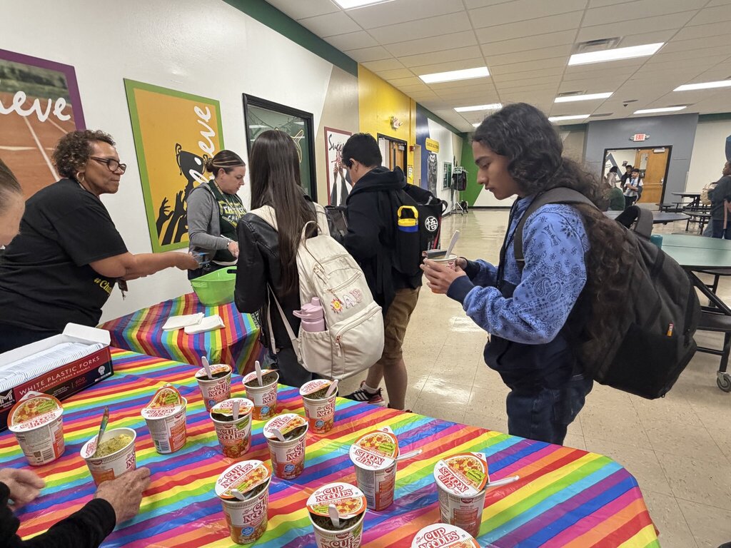 Students in line for cup of noodles