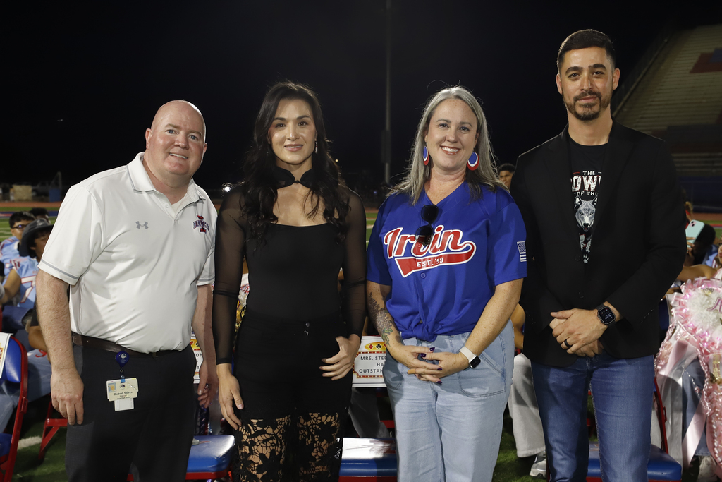 Stephanie Han smiles for a photo with Irvin High Principal Stives, Trustee Sutton, and Magoffin Middle SchoolPrincipal  Ismail during the Irvin High School Homecoming Rally
