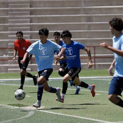 students playing soccer