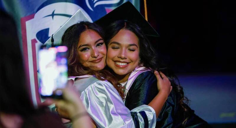 graduates embrace