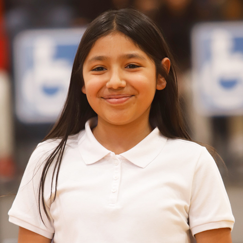 a student poses for the camera