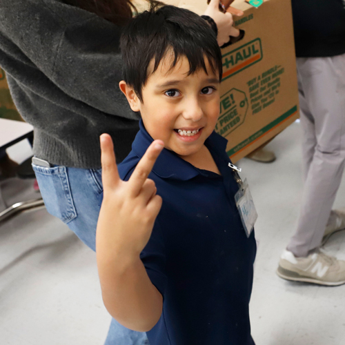 a student poses for the camera