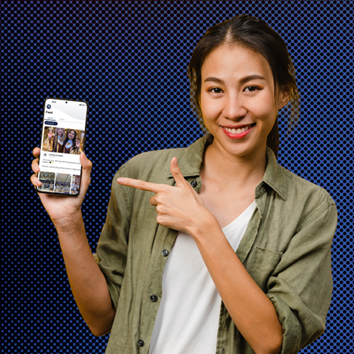 a woman holding the el paso isd app