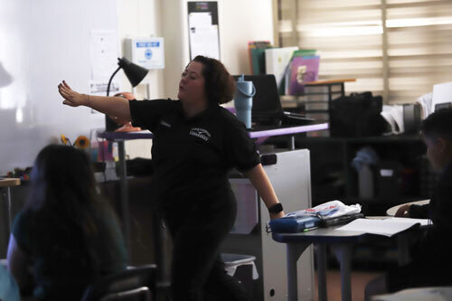 lamar teacher instructs a classroom