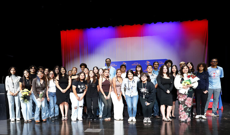 An image of students on a stage