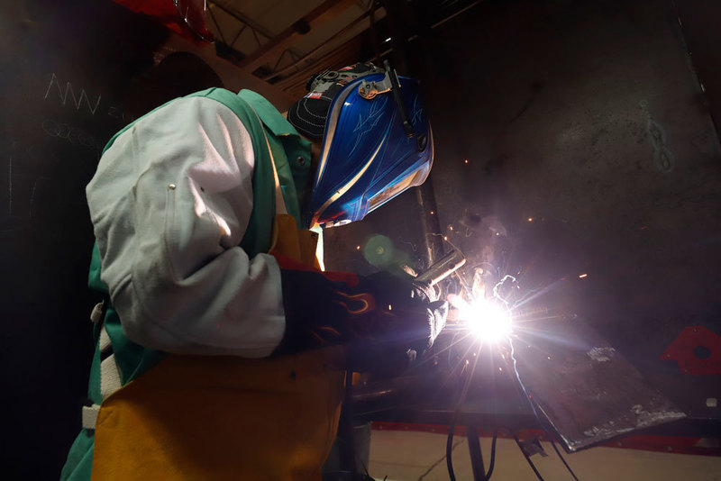 A student welder is shown