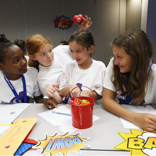 Student play inside a classroom