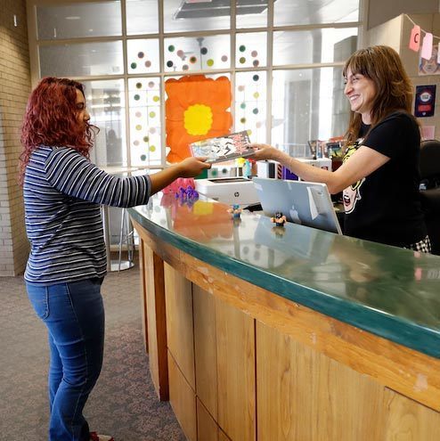 two librarians in a library