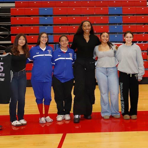 students stand with kayla thornton