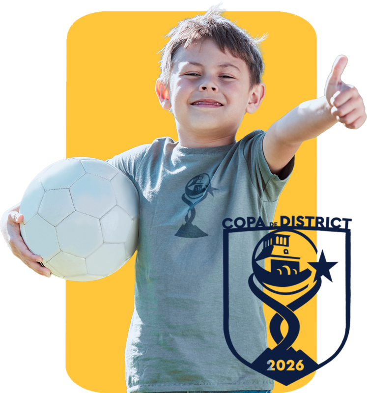 A student holds a soccer ball
