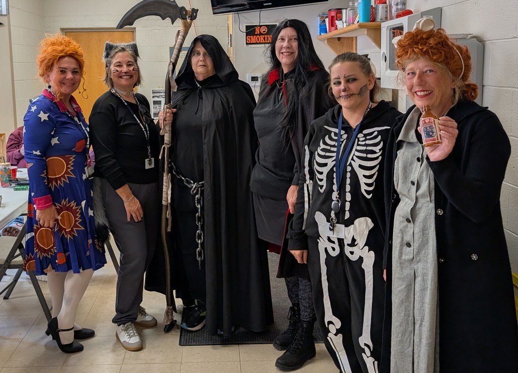 Bus drivers dressed up for Halloween