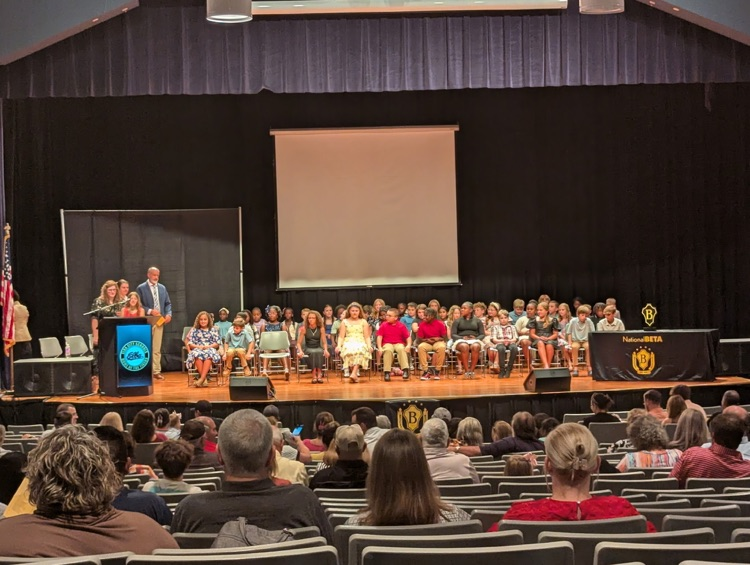 A group of people on a stage.