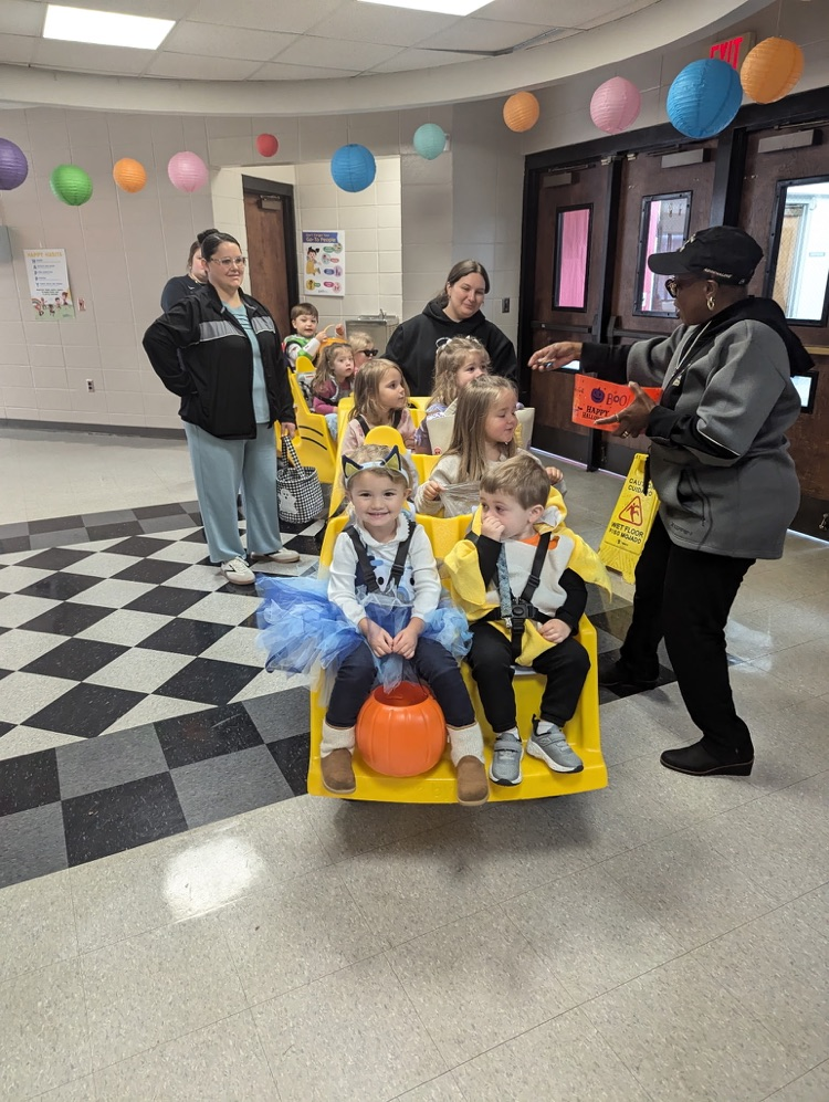 A group of kids on a wagon
