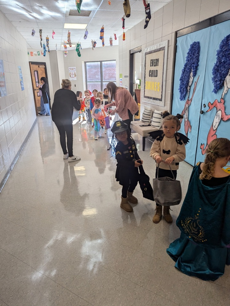 A group of kids trick or treating