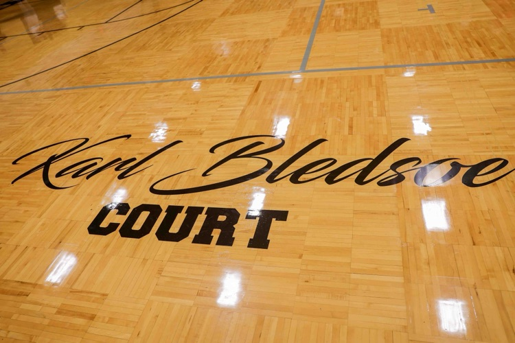 A picture of text on a basketball court.
