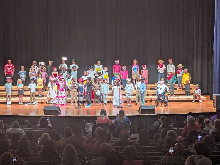 A group of students on the stage.