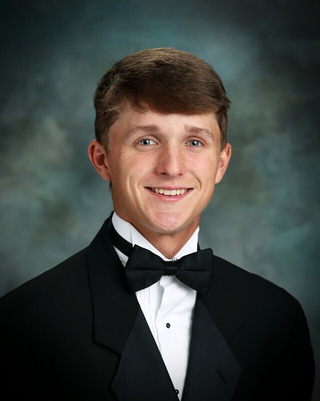A head shot of a young man.