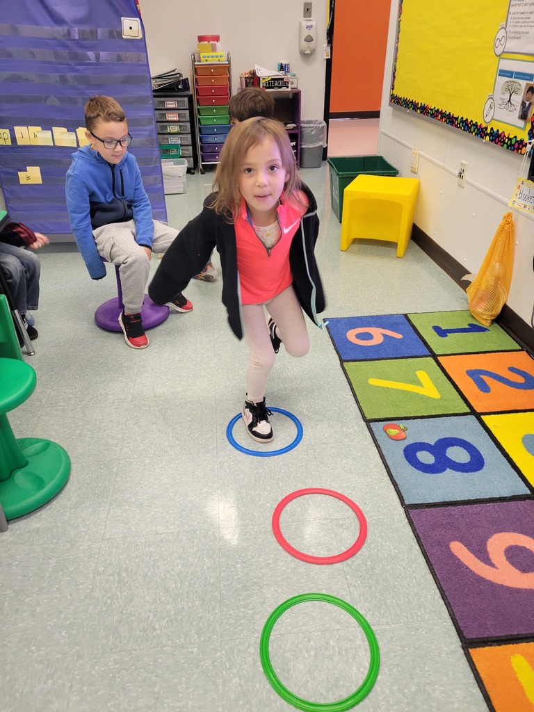 Image of a student playing a hopping game
