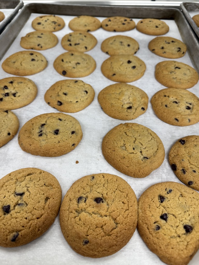 Image of freshly baked chocolate chip cookies just out of the oven