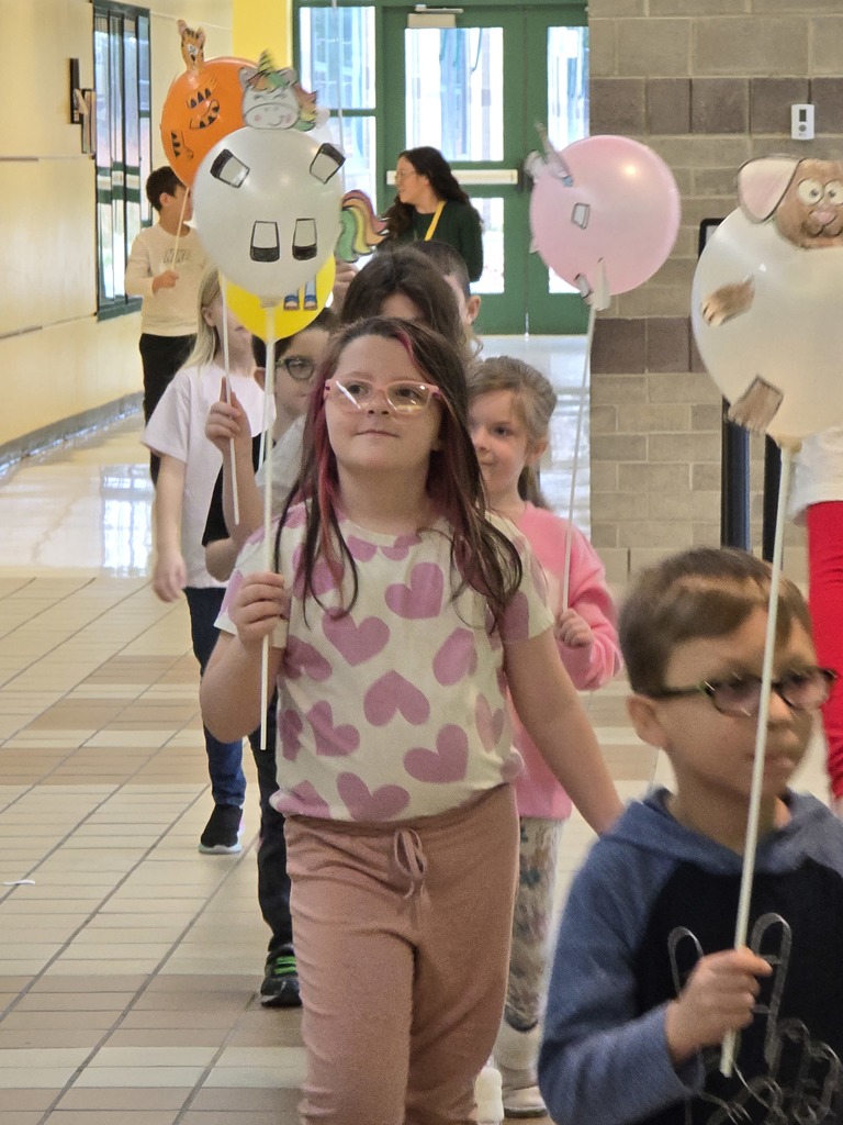 Image of students walking in their balloon parade