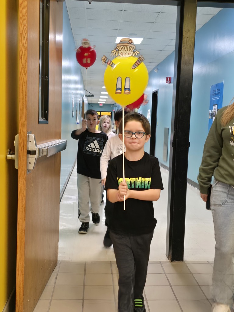 Image of students walking in their balloon parade