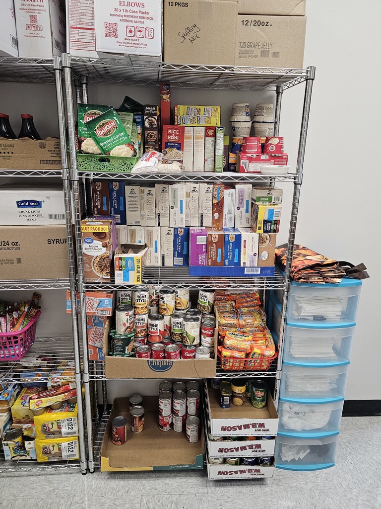 Image of a food pantry with shelves stocked with food